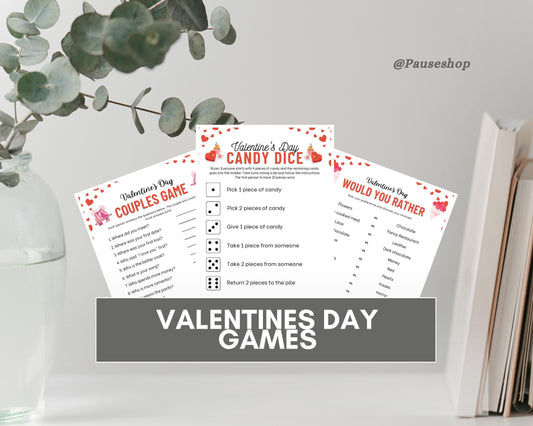 a collection of Valentine's Day games, including a "Candy Dice" game and a "Would You Rather" game, displayed on a shelf with a plant in the background.