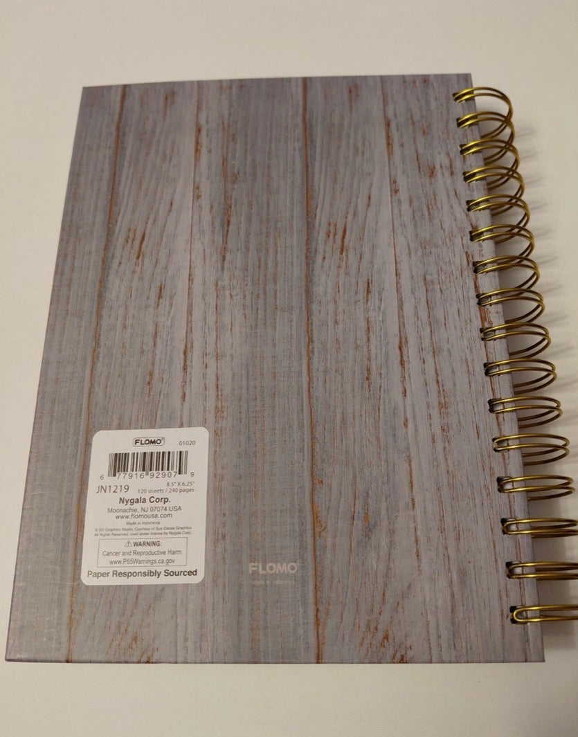 Back cover of the Fueled by Jesus and Coffee notebook showing size and page count