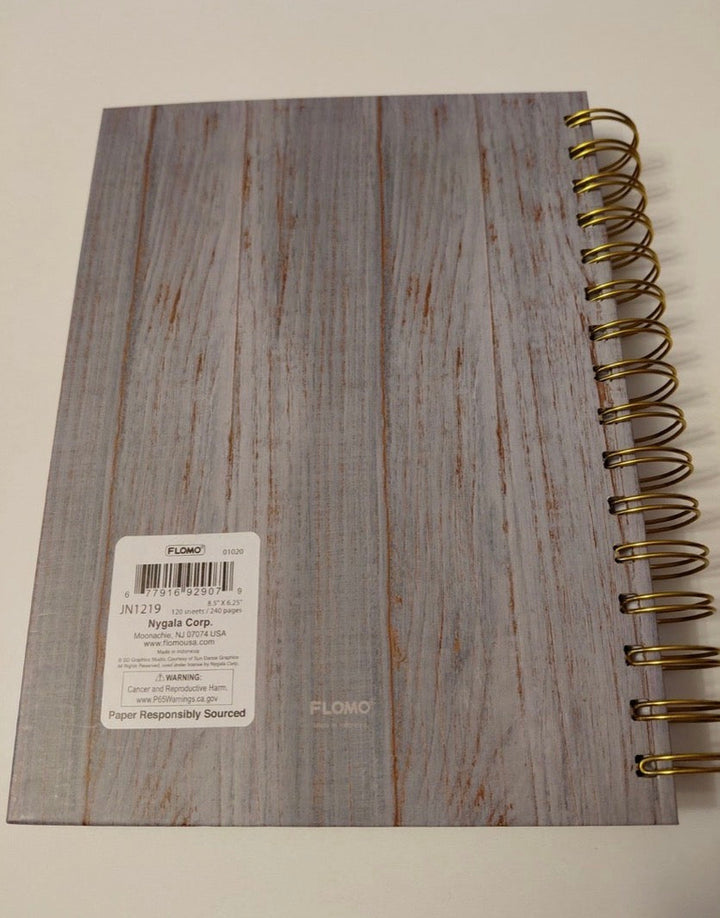 Back cover of the Fueled by Jesus and Coffee notebook showing size and page count